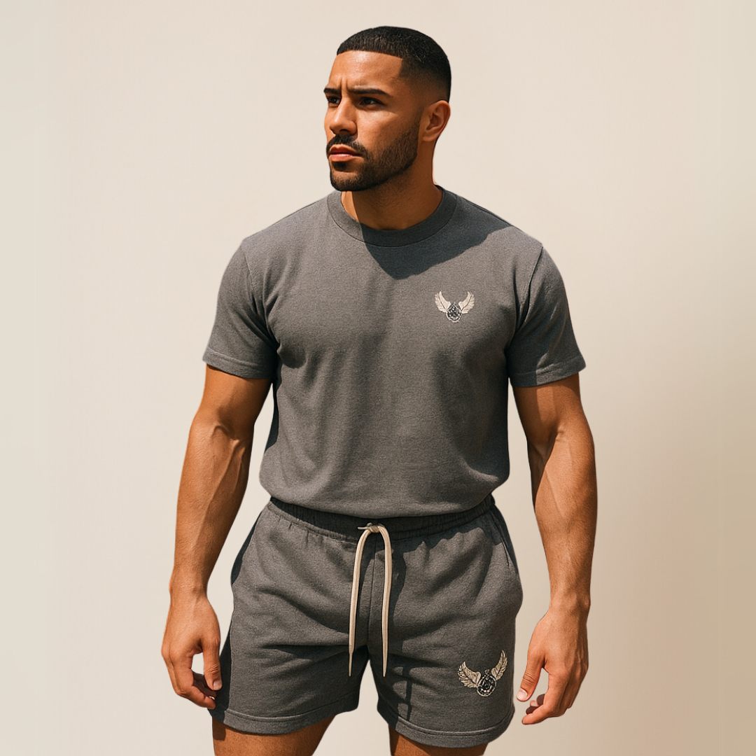 man wearing Respectfully Great grey shorts and grey T-shirt.